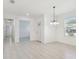Bright entryway featuring tile floors and a view into a separate dining space at 16710 Shell Bay Dr, Land O Lakes, FL 34638