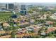 Aerial view of the community with palm trees, a pool, and convenient parking at 1901 Oyster Catcher Ln # 823, Clearwater, FL 33762