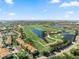 Beautiful aerial view of golf course community with lakes and meticulously landscaped grounds in a desirable neighborhood at 1901 Oyster Catcher Ln # 823, Clearwater, FL 33762