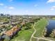 Beautiful aerial view of townhomes overlooking a golf course and pond at 1901 Oyster Catcher Ln # 823, Clearwater, FL 33762
