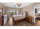 This cozy bedroom features a nautical theme and scenic views of the serene surroundings at 1901 Oyster Catcher Ln # 823, Clearwater, FL 33762