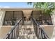 Exterior view of the condo buildings with stairway access to upper-level units at 1901 Oyster Catcher Ln # 823, Clearwater, FL 33762