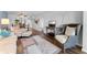 Open living space flows from the sitting area to the dining room, highlighted by hardwood floors at 1901 Oyster Catcher Ln # 823, Clearwater, FL 33762