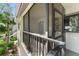 Enjoy fresh air on this screened patio with black frame and green surroundings at 1901 Oyster Catcher Ln # 823, Clearwater, FL 33762