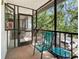 Relax on the screened patio with seating, offering a private outdoor space at 1901 Oyster Catcher Ln # 823, Clearwater, FL 33762