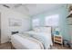 Calming bedroom features soft tones, natural light, and comfortable furnishings for a serene and relaxing retreat at 2261 Queen S St, St Petersburg, FL 33712