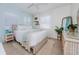 Serene bedroom with neutral colors, bright natural light, and elegant decor, creating a peaceful retreat at 2261 Queen S St, St Petersburg, FL 33712