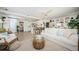 Bright, open-concept living room with kitchen and breakfast bar at 2261 Queen S St, St Petersburg, FL 33712