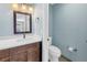 Modern bathroom showing stylish vanity and toilet with matching hardware at 2312 Heron Cir, Clearwater, FL 33762