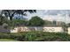 Feather Sound community sign amid manicured landscaping and corporate buildings in the background at 2312 Heron Cir, Clearwater, FL 33762