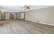 Bright, expansive living space features modern flooring and seamlessly connects to other areas of the home at 2312 Heron Cir, Clearwater, FL 33762