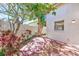 Brick paved patio with lush landscaping and privacy fence at 2581 Forest Run Ct, Clearwater, FL 33761