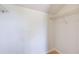 Inside view of bright, walk-in closet space featuring wire shelving and wood flooring at 2581 Forest Run Ct, Clearwater, FL 33761