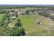 Large lot offers serene privacy, outbuildings, and room to grow with a rural landscape at 260 Moccasin Hollow Rd, Lithia, FL 33547