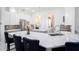 Modern kitchen with white cabinetry, stainless steel appliances, and a large center island at 260 Moccasin Hollow Rd, Lithia, FL 33547