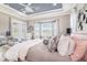 This spacious main bedroom boasts access to outdoor balcony with natural light and neutral color palette at 260 Moccasin Hollow Rd, Lithia, FL 33547