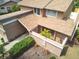 An attractive home featuring a secluded front patio with tropical plants and well-maintained landscaping at 3103 Taragrove Dr, Tampa, FL 33618