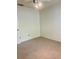 Bedroom with plush carpeting and neutral walls, offering a cozy and adaptable living space at 3629 Indigo Pond Dr # 3629, Palm Harbor, FL 34685