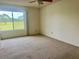 A bedroom showcasing large windows at 3629 Indigo Pond Dr # 3629, Palm Harbor, FL 34685