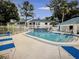 Relax by the community pool with comfortable lounge chairs, perfect for enjoying sunny days at 3629 Indigo Pond Dr # 3629, Palm Harbor, FL 34685