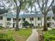 Charming condo complex with well-manicured landscaping, offering a serene living environment at 3629 Indigo Pond Dr # 3629, Palm Harbor, FL 34685