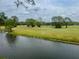 Enjoy serene golf course views with lush greenery and tranquil waters at 3629 Indigo Pond Dr # 3629, Palm Harbor, FL 34685
