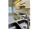 Kitchen area showcasing cabinetry and tile flooring at 3629 Indigo Pond Dr # 3629, Palm Harbor, FL 34685