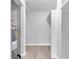 An unfinished basement with wood laminated flooring provides additional storage space at 406 W Cedar St # 403, Tampa, FL 33606