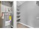 Basement space features a water heater and unfinished storage shelving at 406 W Cedar St # 403, Tampa, FL 33606