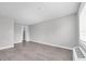 This spacious bedroom offers laminated flooring, neutral walls, and an AC unit at 406 W Cedar St # 403, Tampa, FL 33606