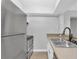 An inviting kitchen with stainless steel appliances and light countertops at 406 W Cedar St # 403, Tampa, FL 33606
