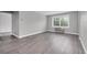Living room showcasing durable wood-look flooring and bright window at 406 W Cedar St # 403, Tampa, FL 33606