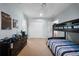 Bedroom featuring a bunk bed, carpeted flooring, and a double door closet at 4105 W Corona St, Tampa, FL 33629