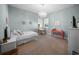 Bedroom with plenty of natural light, chandelier, and two work stations at 4105 W Corona St, Tampa, FL 33629