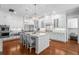 Spacious white kitchen boasts a large island, stainless steel appliances, and an abundance of cabinet space at 4105 W Corona St, Tampa, FL 33629