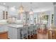 Bright and spacious kitchen with a large island, modern appliances, and hardwood floors at 4105 W Corona St, Tampa, FL 33629