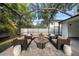Comfortable, enclosed patio seating offers an intimate gathering space for entertainment at 4105 W Corona St, Tampa, FL 33629