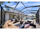 Charming outdoor seating area with comfortable seating, perfect for relaxing poolside at 4105 W Corona St, Tampa, FL 33629