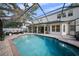 Backyard pool and patio offer relaxation and entertainment at 4105 W Corona St, Tampa, FL 33629