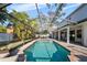A luxurious enclosed pool with spacious deck. Perfect for relaxing or entertaining guests at 4105 W Corona St, Tampa, FL 33629
