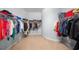 Spacious walk-in closet with custom shelves and plenty of hanging space at 4105 W Corona St, Tampa, FL 33629