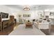 Comfortable living room with dark hardwood floors and neutral furnishings at 4310 W Sevilla St, Tampa, FL 33629