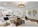 Bright living room with hardwood floors, natural light, and white trim at 4310 W Sevilla St, Tampa, FL 33629