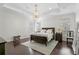 Spacious main bedroom showcasing trey ceilings and dark wood flooring at 4310 W Sevilla St, Tampa, FL 33629