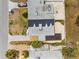 Aerial view highlighting the home's layout and a large, inviting wooden pergola for outdoor living at 438 62Nd St, Holmes Beach, FL 34217