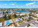 Neighborhood aerial view showcasing homes and waterfront views with lush landscaping at 438 62Nd St, Holmes Beach, FL 34217