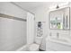 Clean bathroom features a shower-tub combo, and a modern vanity at 438 62Nd St, Holmes Beach, FL 34217