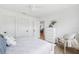 Bedroom featuring light wood floors, white walls and direct access to other rooms at 438 62Nd St, Holmes Beach, FL 34217