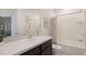 Bright bathroom featuring single sink and shower-tub combination at 522 Mangrove Shade Cir, Apollo Beach, FL 33572