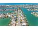 Waterfront home includes a private dock, creating an ideal setting for coastal living and boating adventures at 540 115Th Ave, Treasure Island, FL 33706